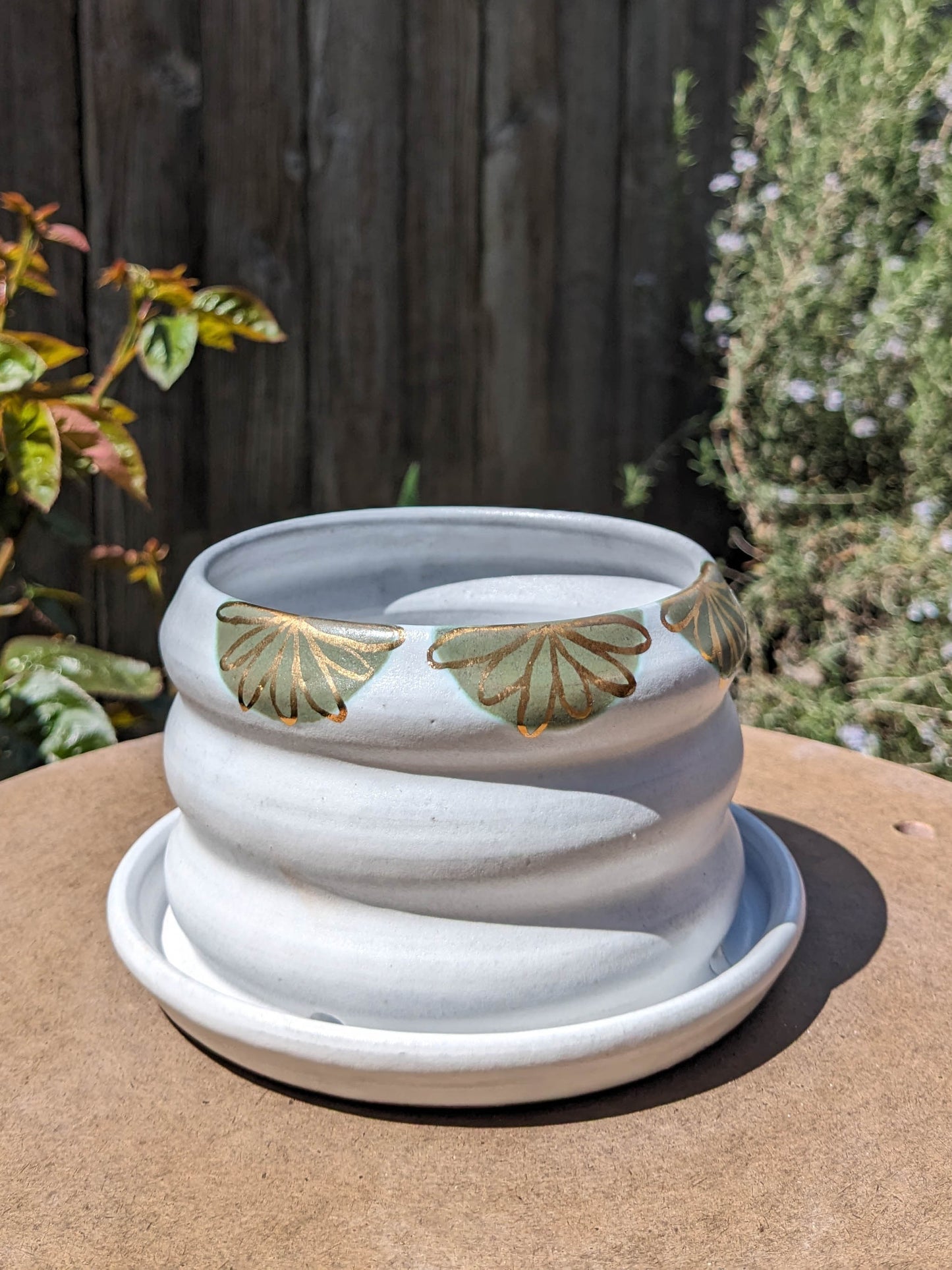 curvy white and floral planter